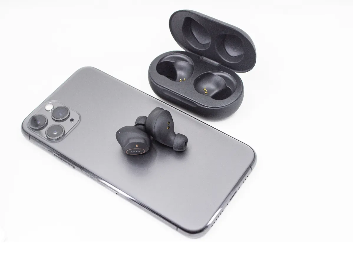 Small Wireless Earbuds in White or Black - Gives hearing aids to people in need